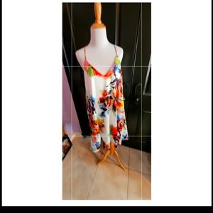 NICOLE MILLER Polyester slip dress. size 12....with pockets.